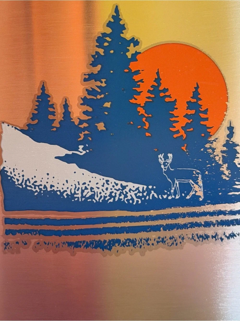 Ozark Trail Silver Hip Flask with Blue Forest and Orange Sun Design